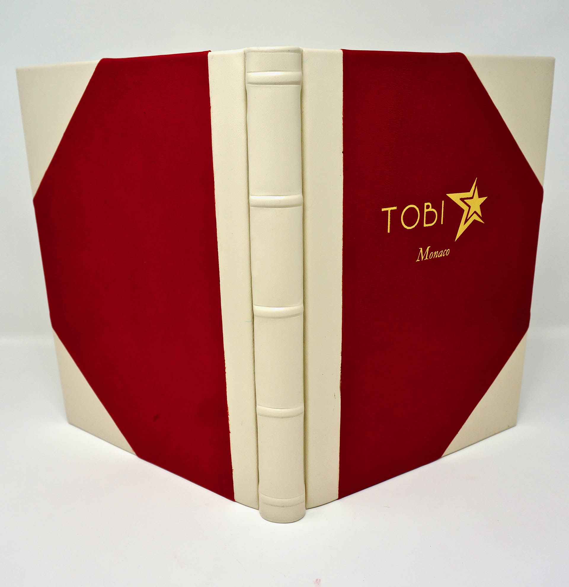 Boston Harbor Bookbindery
www.bostonharborbooks.com

Monaco Sailing Journal; Custom red/white leather book, designed and executed for the client’s yacht adventures.